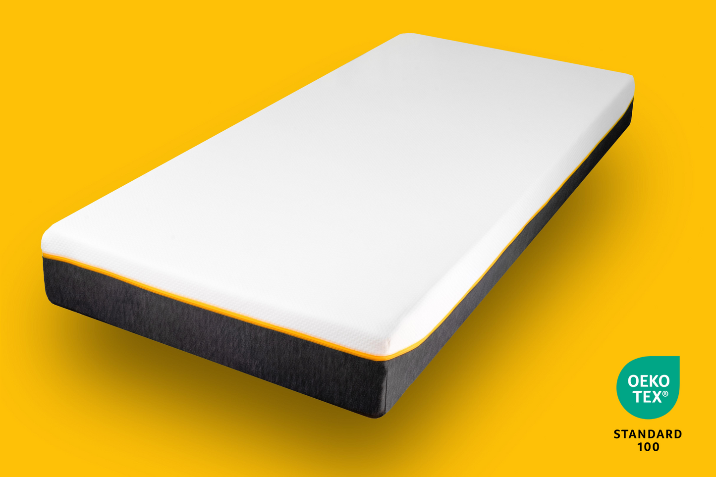 JOMFY BOOST Matratze frontal mit schwarzem Bezug und gelben Hintergrund