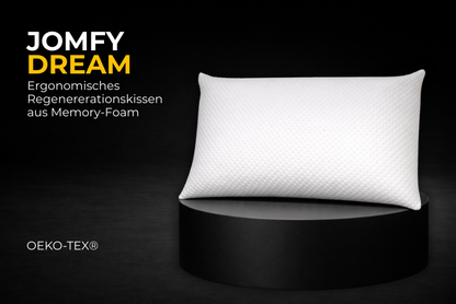 Ergonomisches Regenerationskissen JOMFY DREAM aus Memory-Foam auf schwarzem Podest, minimalistisches Produktbild mit OEKO-TEX®-Zertifizierung.